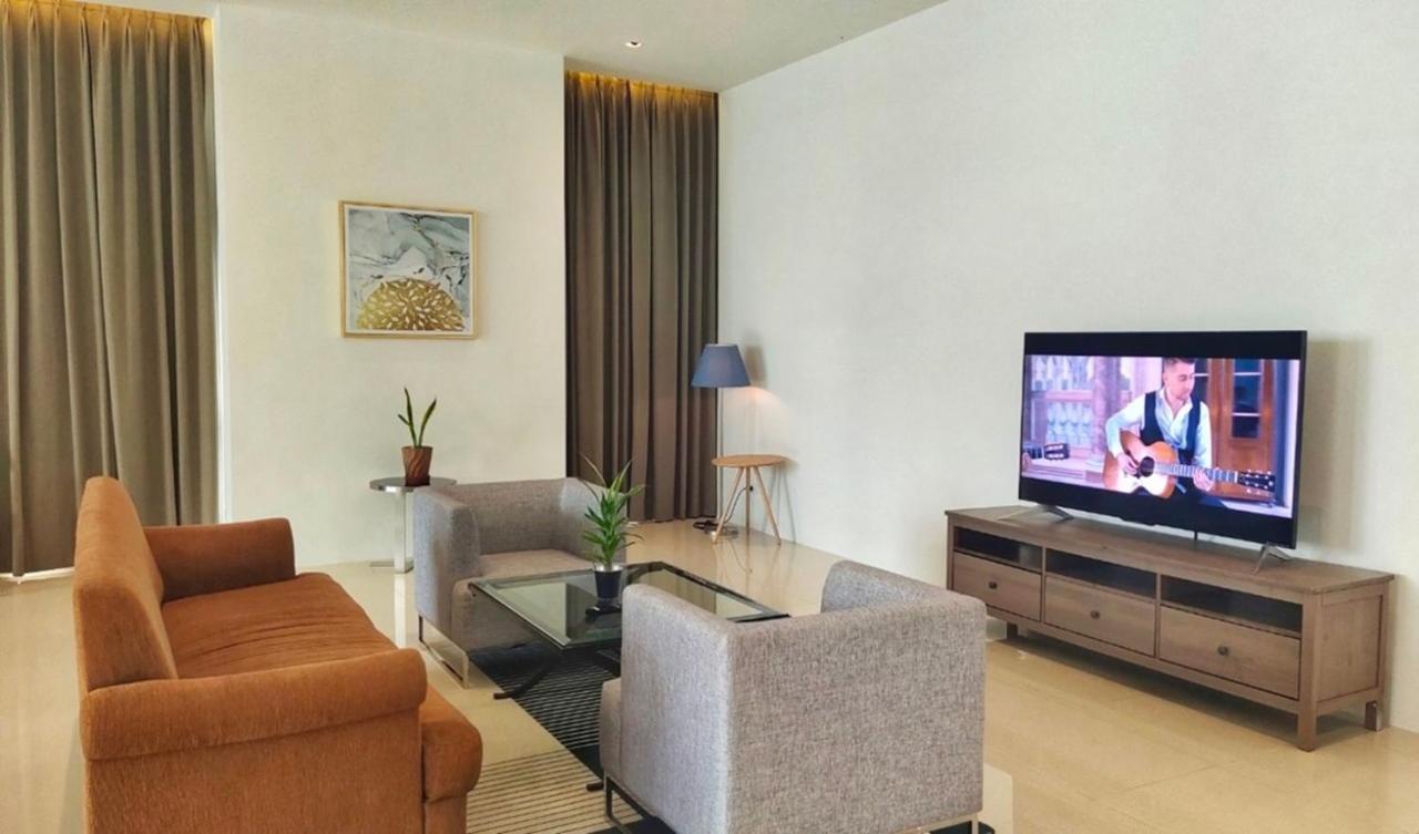 Jasmine 59 Hotel Bangkok Exterior photo A living room in a serviced apartment in Ho Chi Minh City, Vietnam